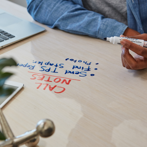 Write on desks with dry erase markers! Erase with sock, tissue, etc. No  need for whiteboards!